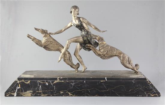 Jean Lormier (French 19th/20th century). An Art Deco patinated bronze group of a young lady with a pair of borzois, The Dance, 32in.,